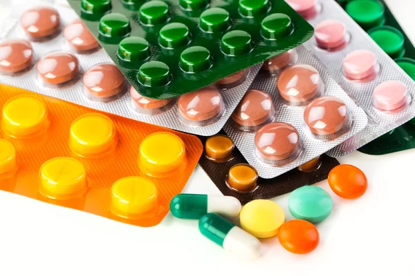 Heap de comprimidos coloridos . — Fotografia de Stock
