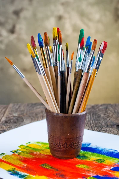 Paints and brushes — Stock Photo, Image