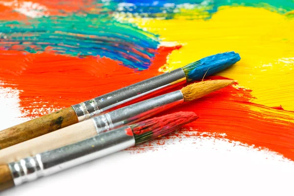 Paints and brushes — Stock Photo, Image