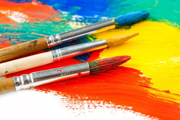 Paints and brushes — Stock Photo, Image