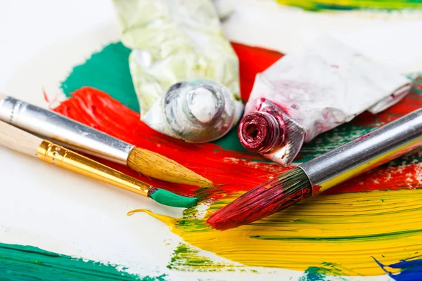 Paints and brushes — Stock Photo, Image