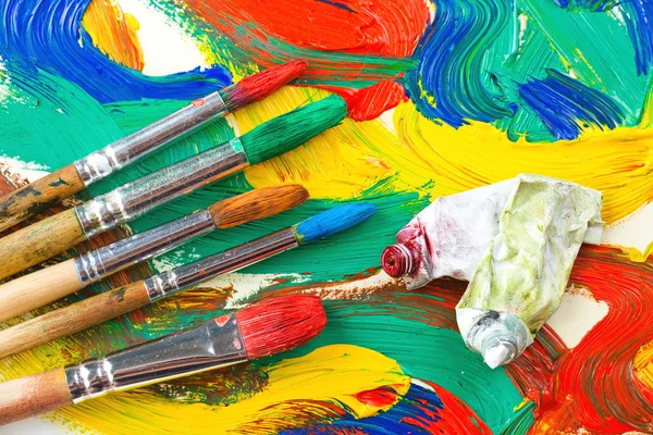 Paints and brushes — Stock Photo, Image