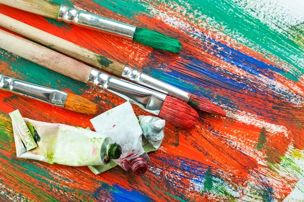 Paints and brushes — Stock Photo, Image