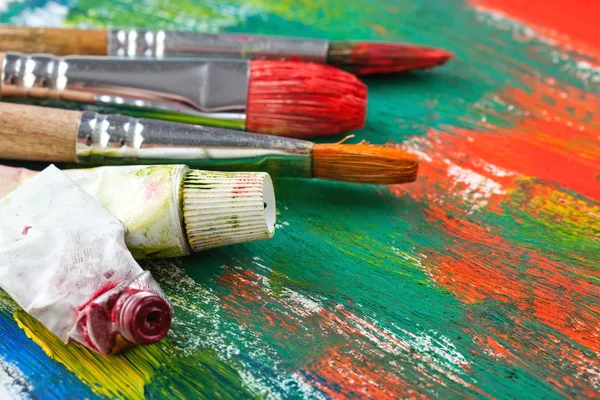 Paints and brushes — Stock Photo, Image