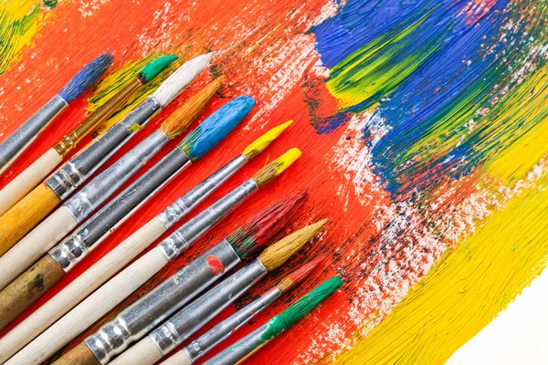 Paints and brushes — Stock Photo, Image