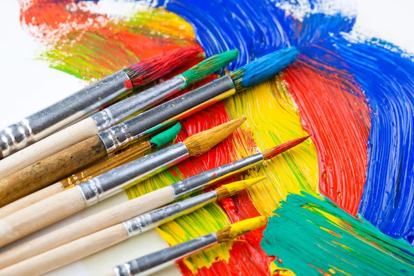 Paints and brushes — Stock Photo, Image