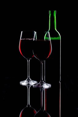 Wine in a glass on a black background