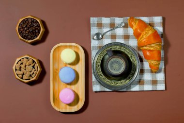 Coffee with dessert on a bright colored 