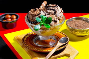 Ice cream on the table on a bright, colored background