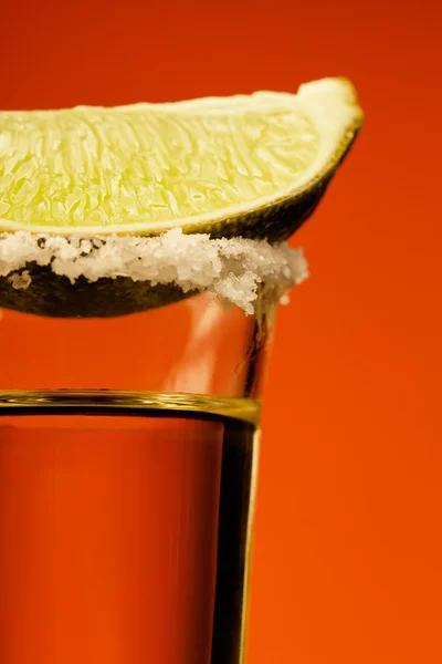 Small glass og tequila with lime — Stock Photo, Image