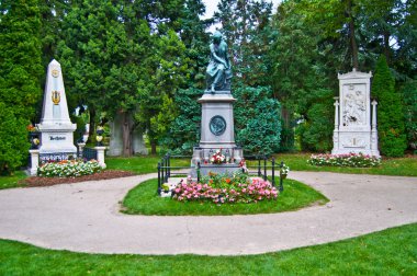 graves of Beethoven, Mozart and Schubert clipart