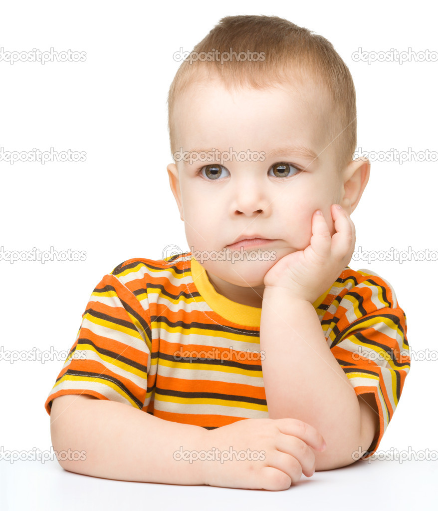 Portrait of a cute and pensive little boy