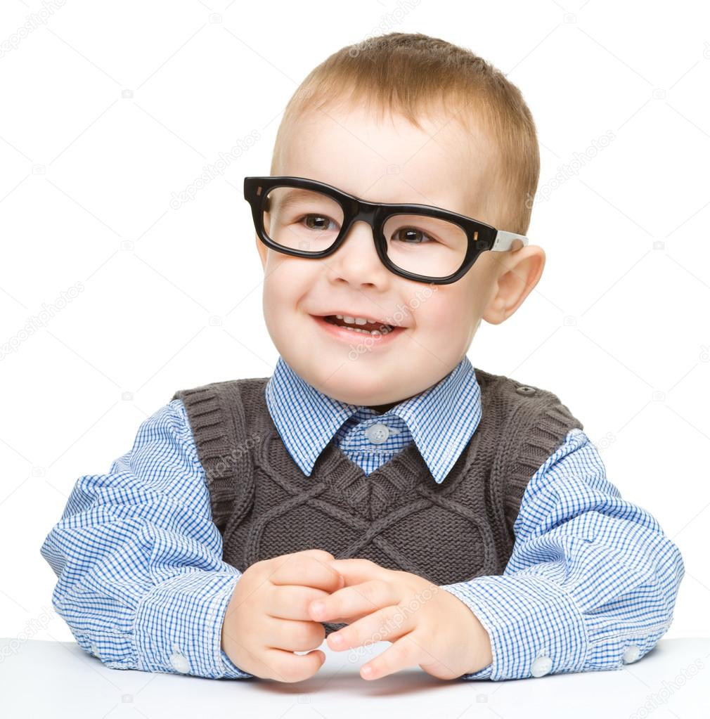 Portrait of a cute little boy wearing glasses