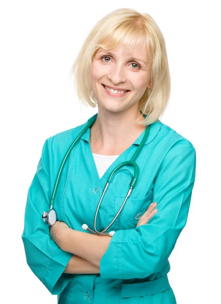 Portrait of a woman wearing doctor uniform — Stock Photo, Image