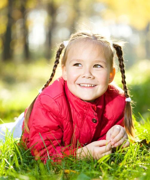 Portrait of a little girl in autumn park Stock Image