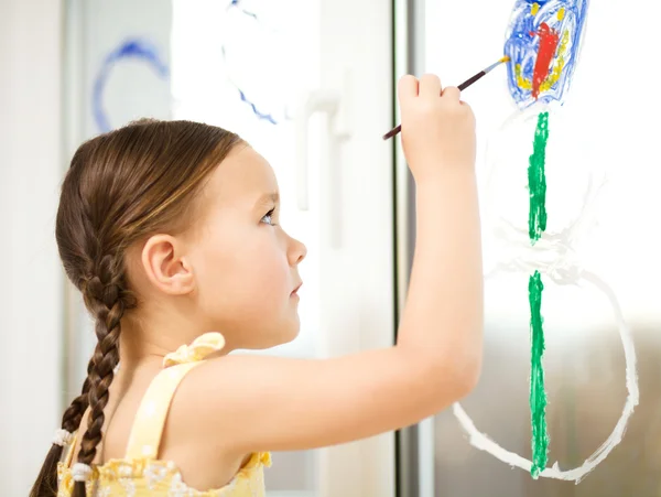 Portrait of a cute girl playing with paints — Stock Photo, Image