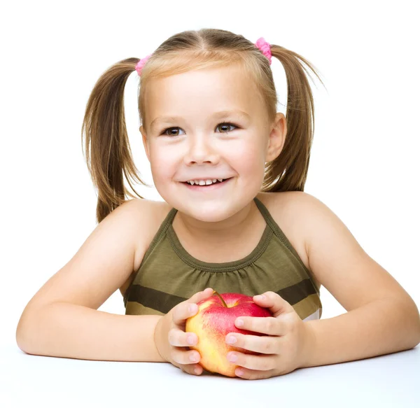 Niña con manzana roja —  Fotos de Stock