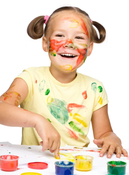 Portrait of a cute girl playing with paints — Stock Photo, Image