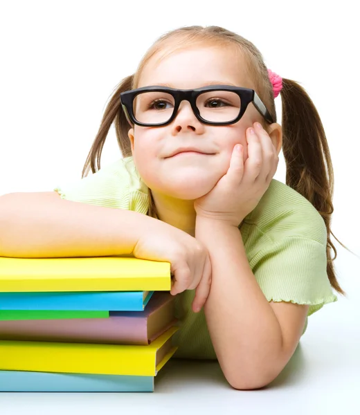 Little girl with books — Stock Photo, Image