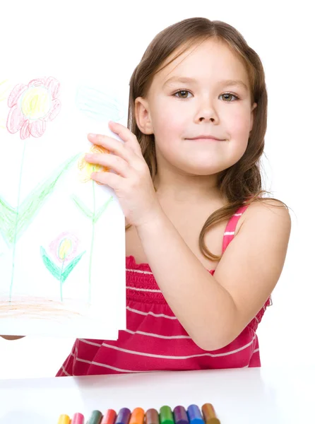 Κοριτσάκι δείχνει σχέδιο — Φωτογραφία Αρχείου