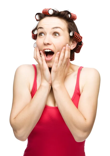 Woman is holding her face in astonishment — Stock Photo, Image