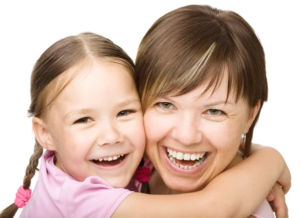 Portret van een gelukkige moeder met haar dochter — Stockfoto