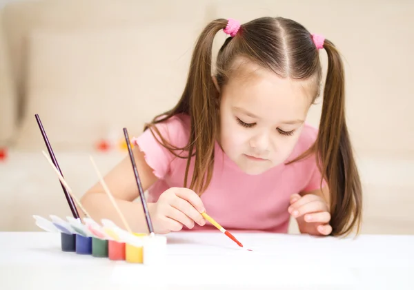 Cute cheerful child play with paints — Stock Photo, Image