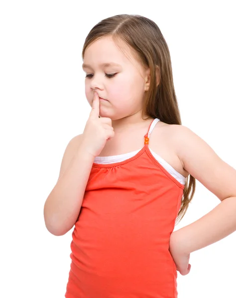 Little girl is thinking about something — Stock Photo, Image