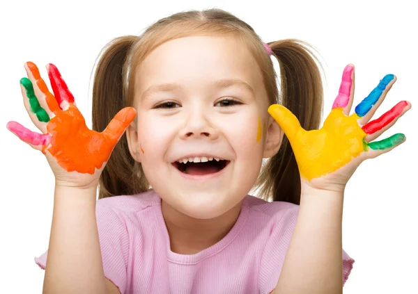 Portrait of a cute girl playing with paints — Stock Photo, Image