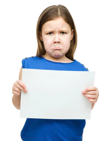 Little girl is holding blank banner — Stock Photo, Image