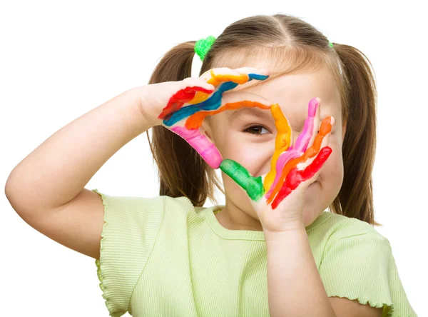 Portrait of a cute girl playing with paints — Stock Photo, Image