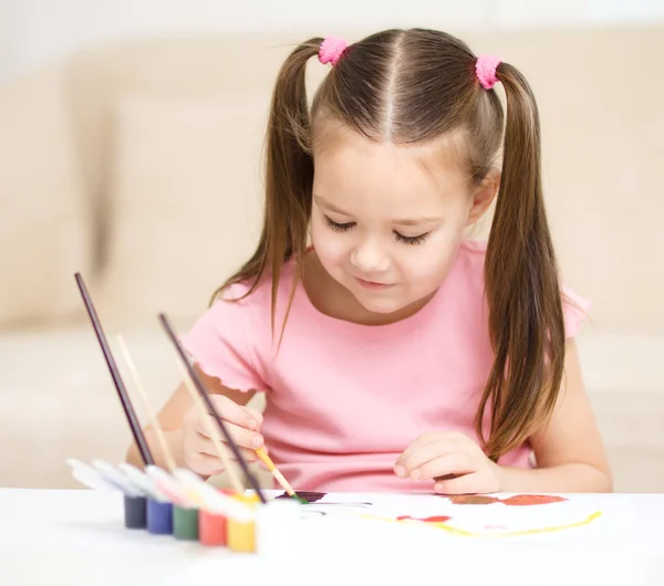 Cute cheerful child play with paints — Stock Photo, Image
