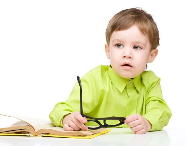 Little child play with book — Stock Photo, Image