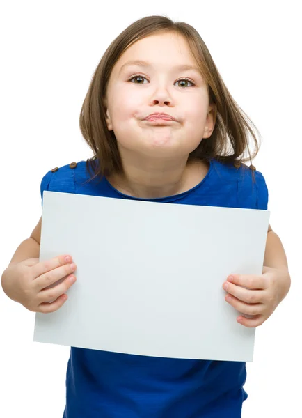 Little girl is holding blank banner — Stock Photo, Image