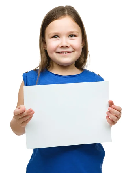 Little girl is holding blank banner Royalty Free Stock Photos