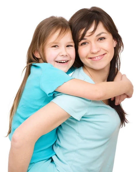 Mutlu bir anne ile kızının portresi — Stok fotoğraf