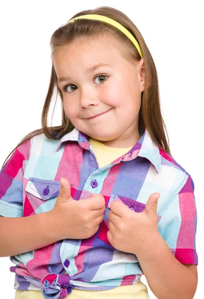 Little girl is showing thumb up gesture — Stock Photo, Image