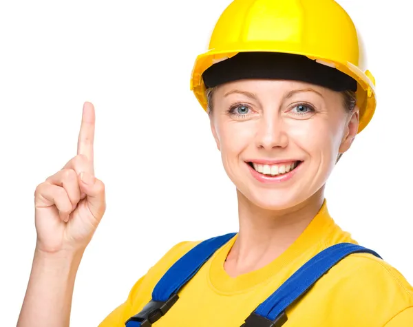Young construction worker pointing up — Stock Photo, Image