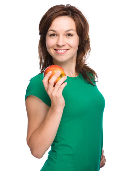 Joven chica feliz con manzana — Foto de Stock