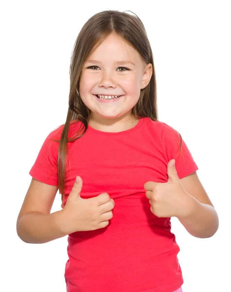 Dziewczynka pokazuje kciuk gest — Zdjęcie stockowe