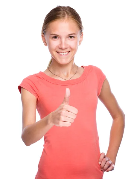 Young girl is showing thumb up gesture — Stock Photo, Image