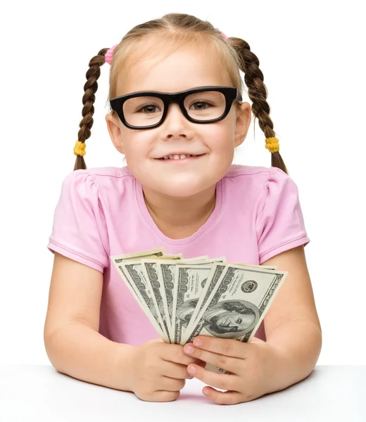 Dziewczynka jest inwentaryzacji dolarów — Zdjęcie stockowe
