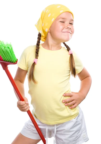 Jong meisje is gekleed als een schoonmaak meid — Stockfoto