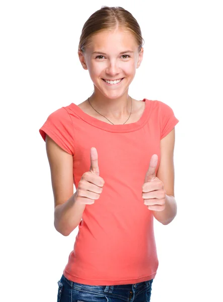 Young girl is showing thumb up gesture — Stock Photo, Image