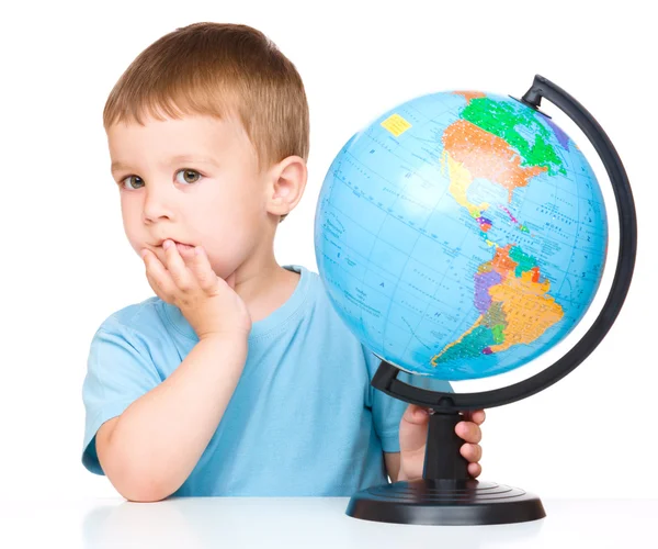 Little boy with a globe — Stock Photo, Image