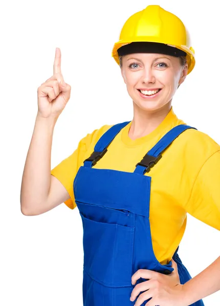 Young construction worker pointing up — Stock Photo, Image