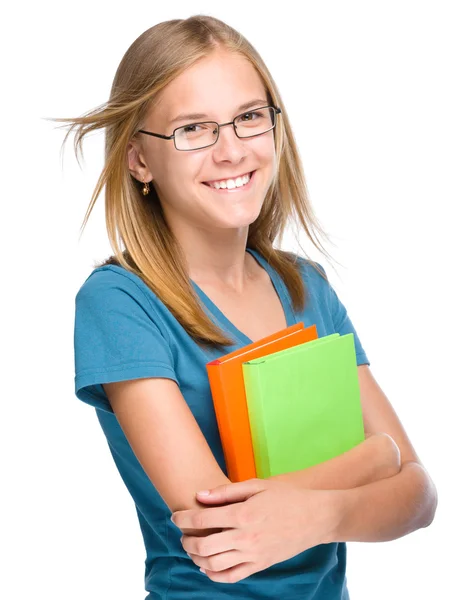 Joven estudiante chica está sosteniendo libro — Foto de Stock