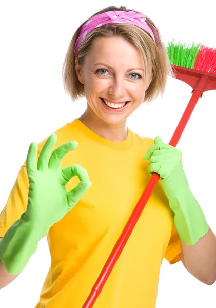 Jonge vrouw als een schoonmaak meid — Stockfoto