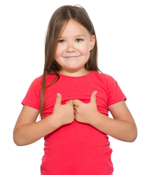 Маленькая девочка показывает большой палец вверх жестом — стоковое фото