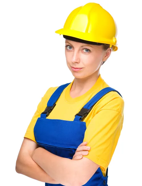 Ung dam som en byggnadsarbetare — Stockfoto
